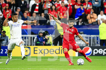 2022-05-28 - PARIS, FRANCE - MAY 28: Mohamed Salah of Liverpool (R) attempts a kick while being defended by Carlos Casemiro of Real Madrid CF (L) during the UEFA Champions League final match between Liverpool FC and Real Madrid at Stade de France on May 28, 2022 in Paris, France. - LIVERPOOL FC V REAL MADRID - UEFA CHAMPIONS LEAGUE FINAL 2021/22 - UEFA CHAMPIONS LEAGUE - SOCCER