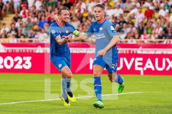 2022-08-02 - Joey Veerman of PSV Eindhoven is celebrating his goal 0-1 with Luuk de Jong during the UEFA Champions League, third qualifying round football match between AS Monaco and PSV Eindhoven on August 2, 2022 at Stade Louis II in Monaco, Monaco - FOOTBALL - CHAMPIONS LEAGUE - MONACO V PSV EINDHOVEN - UEFA CHAMPIONS LEAGUE - SOCCER
