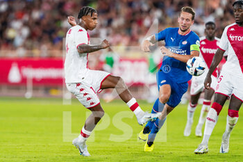 2022-08-02 - Ismail Jakobs of AS Monaco, Luuk de Jong of PSV Eindhoven during the UEFA Champions League, third qualifying round football match between AS Monaco and PSV Eindhoven on August 2, 2022 at Stade Louis II in Monaco, Monaco - FOOTBALL - CHAMPIONS LEAGUE - MONACO V PSV EINDHOVEN - UEFA CHAMPIONS LEAGUE - SOCCER