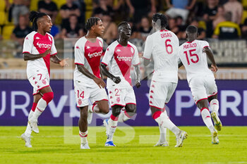 2022-08-02 - Axel Disasi of AS Monaco celebrates his goal 1-1 with teammates during the UEFA Champions League, third qualifying round football match between AS Monaco and PSV Eindhoven on August 2, 2022 at Stade Louis II in Monaco, Monaco - FOOTBALL - CHAMPIONS LEAGUE - MONACO V PSV EINDHOVEN - UEFA CHAMPIONS LEAGUE - SOCCER