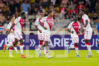 2022-08-02 - Axel Disasi of AS Monaco celebrates his goal 1-1 with teammates during the UEFA Champions League, third qualifying round football match between AS Monaco and PSV Eindhoven on August 2, 2022 at Stade Louis II in Monaco, Monaco - FOOTBALL - CHAMPIONS LEAGUE - MONACO V PSV EINDHOVEN - UEFA CHAMPIONS LEAGUE - SOCCER