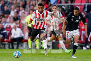 2022-08-09 - Cody Gakpo of PSV Eindhoven, Vanderson of AS Monaco during the UEFA Champions League, Third qualifying round, 2nd leg football match between PSV Eindhoven and AS Monaco on August 9, 2022 at Philips Stadion in Eindhoven, Netherlands - FOOTBALL - CHAMPIONS LEAGUE - PSV EINDHOVEN V MONACO - UEFA CHAMPIONS LEAGUE - SOCCER