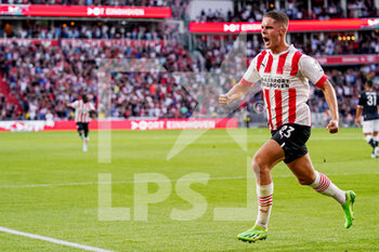 2022-08-09 - Joey Veerman of PSV Eindhoven celebrates after scoring his teams first goal during the UEFA Champions League, Third qualifying round, 2nd leg football match between PSV Eindhoven and AS Monaco on August 9, 2022 at Philips Stadion in Eindhoven, Netherlands - FOOTBALL - CHAMPIONS LEAGUE - PSV EINDHOVEN V MONACO - UEFA CHAMPIONS LEAGUE - SOCCER