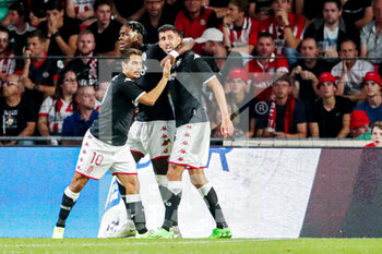 2022-08-09 - Guillermo Maripan of AS Monaco celebrates after scoring a goal 1-1 with Wissam Ben Yedder, Axel Disasi during the UEFA Champions League, Third qualifying round, 2nd leg football match between PSV Eindhoven and AS Monaco on August 9, 2022 at Philips Stadion in Eindhoven, Netherlands - FOOTBALL - CHAMPIONS LEAGUE - PSV EINDHOVEN V MONACO - UEFA CHAMPIONS LEAGUE - SOCCER