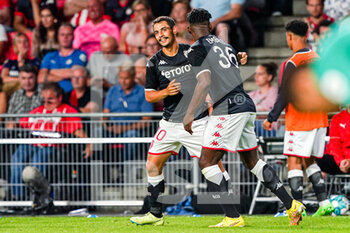 2022-08-09 - Wissam Ben Yedder of AS Monaco celebrates after scoring a goal 1-2 with Breel Embolo during the UEFA Champions League, Third qualifying round, 2nd leg football match between PSV Eindhoven and AS Monaco on August 9, 2022 at Philips Stadion in Eindhoven, Netherlands - FOOTBALL - CHAMPIONS LEAGUE - PSV EINDHOVEN V MONACO - UEFA CHAMPIONS LEAGUE - SOCCER