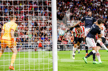 2022-08-09 - Erick Gutierrez of PSV Eindhoven scores a goal 2-2, Youssouf Fofana of AS Monaco during the UEFA Champions League, Third qualifying round, 2nd leg football match between PSV Eindhoven and AS Monaco on August 9, 2022 at Philips Stadion in Eindhoven, Netherlands - FOOTBALL - CHAMPIONS LEAGUE - PSV EINDHOVEN V MONACO - UEFA CHAMPIONS LEAGUE - SOCCER