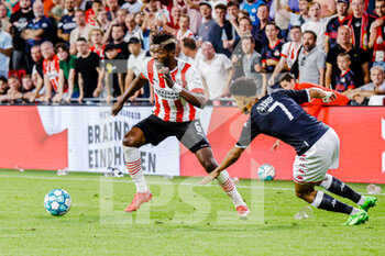 2022-08-09 - Ibrahim Sangare of PSV Eindhoven, Sofiane Diop of AS Monaco during the UEFA Champions League, Third qualifying round, 2nd leg football match between PSV Eindhoven and AS Monaco on August 9, 2022 at Philips Stadion in Eindhoven, Netherlands - FOOTBALL - CHAMPIONS LEAGUE - PSV EINDHOVEN V MONACO - UEFA CHAMPIONS LEAGUE - SOCCER