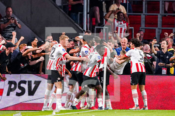 2022-08-09 - Luuk de Jong of PSV Eindhoven celebrates after scoring the winning's goal 3-2 with teammates during the UEFA Champions League, Third qualifying round, 2nd leg football match between PSV Eindhoven and AS Monaco on August 9, 2022 at Philips Stadion in Eindhoven, Netherlands - FOOTBALL - CHAMPIONS LEAGUE - PSV EINDHOVEN V MONACO - UEFA CHAMPIONS LEAGUE - SOCCER