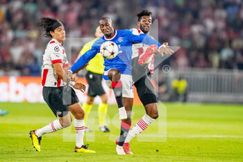 2022-08-24 - Erick Gutierrez of PSV, Glen Kamara of Rangers, Ibrahim Sangare of PSV during the UEFA Champions League, Play-Off Second Leg football match between PSV and Rangers on August 24, 2022 at the Philips Stadion in Eindhoven, Netherlands - FOOTBALL - CHAMPIONS LEAGUE - PSV V RANGERS - UEFA CHAMPIONS LEAGUE - SOCCER