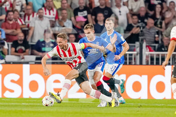 2022-08-24 - Luuk de Jong of PSV, James Sands of Rangers during the UEFA Champions League, Play-Off Second Leg football match between PSV and Rangers on August 24, 2022 at the Philips Stadion in Eindhoven, Netherlands - FOOTBALL - CHAMPIONS LEAGUE - PSV V RANGERS - UEFA CHAMPIONS LEAGUE - SOCCER