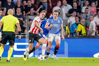 2022-08-24 - Luuk de Jong of PSV, James Sands of Rangers during the UEFA Champions League, Play-Off Second Leg football match between PSV and Rangers on August 24, 2022 at the Philips Stadion in Eindhoven, Netherlands - FOOTBALL - CHAMPIONS LEAGUE - PSV V RANGERS - UEFA CHAMPIONS LEAGUE - SOCCER