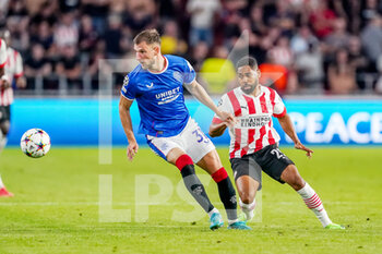 2022-08-24 - Borna Barisic of Rangers, Phillipp Mwene of PSV during the UEFA Champions League, Play-Off Second Leg football match between PSV and Rangers on August 24, 2022 at the Philips Stadion in Eindhoven, Netherlands - FOOTBALL - CHAMPIONS LEAGUE - PSV V RANGERS - UEFA CHAMPIONS LEAGUE - SOCCER