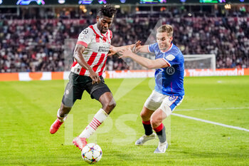 2022-08-24 - Ibrahim Sangare of PSV, James Sands of Rangers during the UEFA Champions League, Play-Off Second Leg football match between PSV and Rangers on August 24, 2022 at the Philips Stadion in Eindhoven, Netherlands - FOOTBALL - CHAMPIONS LEAGUE - PSV V RANGERS - UEFA CHAMPIONS LEAGUE - SOCCER