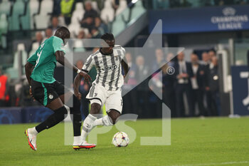 2022-10-05 - Moise Kean (Juventus FC) in action against Abdoulaye Seck (Maccabi Haifa FC) - JUVENTUS FC VS MACCABI HAIFA - UEFA CHAMPIONS LEAGUE - SOCCER