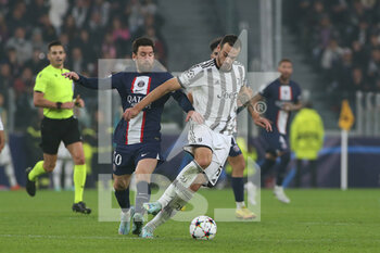 2022-11-02 - Federico Gatti (Juventus FC) in action against Lionel Messi (Paris Saint-Germain) - JUVENTUS FC VS PARIS SAINT-GERMAIN FC - UEFA CHAMPIONS LEAGUE - SOCCER