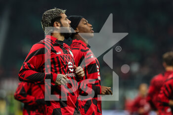 2022-11-02 - Theo Hernandez of AC Milan warms up during UEFA Champions League 2022/23 Group Stage - Group E football match between AC Milan and FC Red Bull Salzburg at Giuseppe Meazza Stadium, Milan, Italy on November 02, 2022 - AC MILAN VS FC RED BULL SALZBURG - UEFA CHAMPIONS LEAGUE - SOCCER