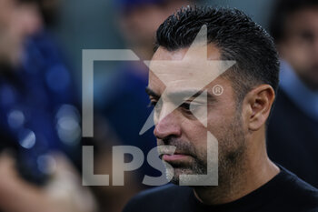 2022-10-04 - Xavi Hernandez Head Coach of FC Barcelona looks on during the UEFA Champions League 2022/23 Group Stage - Group C football match between FC Internazionale and FC Barcelona at Giuseppe Meazza Stadium, Milan, Italy on October 04, 2022 - INTER - FC INTERNAZIONALE VS FC BARCELONA - UEFA CHAMPIONS LEAGUE - SOCCER