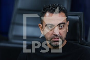 2022-10-04 - Xavi Hernandez Head Coach of FC Barcelona looks on during the UEFA Champions League 2022/23 Group Stage - Group C football match between FC Internazionale and FC Barcelona at Giuseppe Meazza Stadium, Milan, Italy on October 04, 2022 - INTER - FC INTERNAZIONALE VS FC BARCELONA - UEFA CHAMPIONS LEAGUE - SOCCER