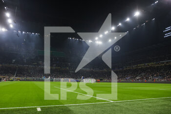 2022-10-04 - Players, staff, officials and fans take part in a moment of silence in memory of the victims of the tragic events at Kanjuruhan Stadium in Indonesia during the UEFA Champions League 2022/23 Group Stage - Group C football match between FC Internazionale and FC Barcelona at Giuseppe Meazza Stadium, Milan, Italy on October 04, 2022 - INTER - FC INTERNAZIONALE VS FC BARCELONA - UEFA CHAMPIONS LEAGUE - SOCCER