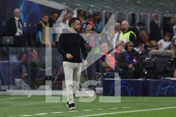2022-10-04 - Xavi Hernandez Head Coach of FC Barcelona during the UEFA Champions League 2022/23 Group Stage - Group C football match between FC Internazionale and FC Barcelona at Giuseppe Meazza Stadium, Milan, Italy on October 04, 2022 - INTER - FC INTERNAZIONALE VS FC BARCELONA - UEFA CHAMPIONS LEAGUE - SOCCER