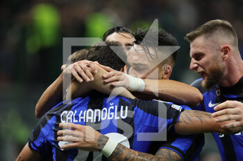 2022-10-04 - Henrikh Mkhitaryan of FC Internazionale celebrates with his team mates after scoring a goal during the UEFA Champions League 2022/23 Group Stage - Group C football match between FC Internazionale and FC Barcelona at Giuseppe Meazza Stadium, Milan, Italy on October 04, 2022 - INTER - FC INTERNAZIONALE VS FC BARCELONA - UEFA CHAMPIONS LEAGUE - SOCCER