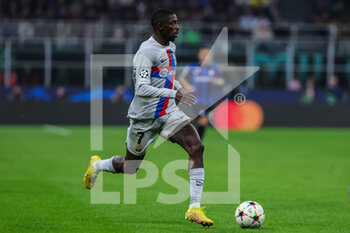 2022-10-04 - Ousmane Dembele of FC Barcelona in action during the UEFA Champions League 2022/23 Group Stage - Group C football match between FC Internazionale and FC Barcelona at Giuseppe Meazza Stadium, Milan, Italy on October 04, 2022 - INTER - FC INTERNAZIONALE VS FC BARCELONA - UEFA CHAMPIONS LEAGUE - SOCCER