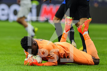 2022-10-04 - Andre Onana of FC Internazionale in action during the UEFA Champions League 2022/23 Group Stage - Group C football match between FC Internazionale and FC Barcelona at Giuseppe Meazza Stadium, Milan, Italy on October 04, 2022 - INTER - FC INTERNAZIONALE VS FC BARCELONA - UEFA CHAMPIONS LEAGUE - SOCCER