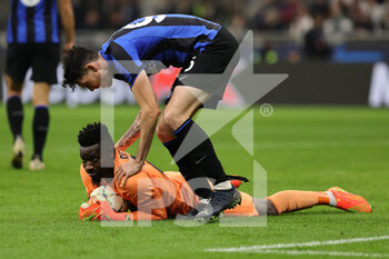 2022-10-04 - Andre Onana of FC Internazionale and Alessandro Bastoni of FC Internazionale during the UEFA Champions League 2022/23 Group Stage - Group C football match between FC Internazionale and FC Barcelona at Giuseppe Meazza Stadium, Milan, Italy on October 04, 2022 - INTER - FC INTERNAZIONALE VS FC BARCELONA - UEFA CHAMPIONS LEAGUE - SOCCER