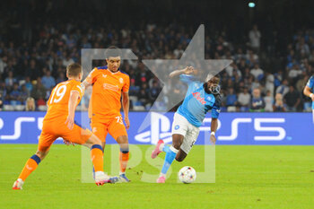 2022-10-26 - Tanguy Ndombele' of SSC Napoli competes for the ball with James Sands Rangers Football Club   during the Uefa Champions League match between SSC Napoli vs Rangers Football Club at Diego Armando Maradona Stadium  - SSN NAPOLI VS RANGERS FC - UEFA CHAMPIONS LEAGUE - SOCCER