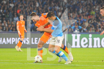 2022-10-26 - Giovanni Simeone of SSC Napoli competes for the ball with Leon King Rangers Football Club  during the Uefa Champions League match between SSC Napoli vs Rangers Football Club at Diego Armando Maradona Stadium  - SSN NAPOLI VS RANGERS FC - UEFA CHAMPIONS LEAGUE - SOCCER