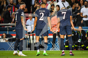 2022-09-06 - Kylian MBAPPE of PSG celebrate his goal with Achraf HAKIMI of PSG and Sergio RAMOS of PSG during the UEFA Champions League, Group H football match between Paris Saint-Germain and Juventus FC on September 6, 2022 at Parc des Princes stadium in Paris, France - FOOTBALL - CHAMPIONS LEAGUE - PARIS SG V JUVENTUS - UEFA CHAMPIONS LEAGUE - SOCCER
