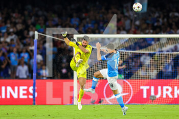 2022-09-07 - Alisson Becker (1) of Liverpool clears the ball from Giovanni Simeone (18) of Napoli during the Champions League match between Napoli and Liverpool at Diego Armando Maradona Stadium, Napoli, Italy on 7 September 2022. Photo Nigel Keene /ProSportsImages / DPPI - FOOTBALL - CHAMPIONS LEAGUE - NAPOLI V LIVERPOOL - UEFA CHAMPIONS LEAGUE - SOCCER