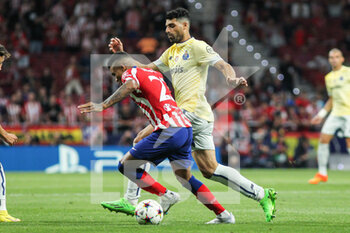 2022-09-07 - Reinildo Mandava of Atletico de Madrid and Mehdi Taremi of Porto during the UEFA Champions League, Group B, football match played between Atletico de Madrid and FC Porto at Civitas Metropolitano on September 07, 2022 in Madrid, Spain. Photo Oscar J. Barroso / SpainDPPI / DPPI - FOOTBALL - CHAMPIONS LEAGUE - ATLETICO MADRID V PORTO - UEFA CHAMPIONS LEAGUE - SOCCER