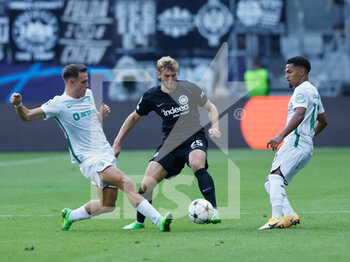 2022-09-07 - Manuel Ugarte of Sporting, Christopher Lenz of Eintracht Frankfurt, and Marcus Edwards of Sporting during the Champions League match between Eintracht Frankfurt and Sporting CP at Frankfurt stadion, Frankfurt, Germany on 7 September 2022 Photo Heiko Becker / Firo sportphoto / DPPI - FOOTBALL - CHAMPIONS LEAGUE - EINTRACHT FRANKFURT V SPORTING CP - UEFA CHAMPIONS LEAGUE - SOCCER