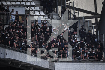 2022-09-13 - Supporters of Eintracht Frankfurt with Special mobile French Police Force (CRS) during the UEFA Champions League, Group D football match between Olympique de Marseille and Eintracht Frankfurt on September 13, 2022 at Orange Velodrome stadium in Marseille, France - FOOTBALL - CHAMPIONS LEAGUE - OM V EINTRACHT FRANKFURT - UEFA CHAMPIONS LEAGUE - SOCCER