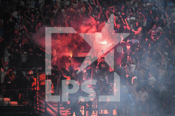 2022-09-13 - Supporters of Marseille using smoke bombs during the UEFA Champions League, Group D football match between Olympique de Marseille and Eintracht Frankfurt on September 13, 2022 at Orange Velodrome stadium in Marseille, France - FOOTBALL - CHAMPIONS LEAGUE - OM V EINTRACHT FRANKFURT - UEFA CHAMPIONS LEAGUE - SOCCER