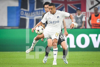 2022-09-13 - Alexis SANCHEZ of Marseille and Daichi KAMADA of Eintracht Frankfurt during the UEFA Champions League, Group D football match between Olympique de Marseille and Eintracht Frankfurt on September 13, 2022 at Orange Velodrome stadium in Marseille, France - FOOTBALL - CHAMPIONS LEAGUE - OM V EINTRACHT FRANKFURT - UEFA CHAMPIONS LEAGUE - SOCCER