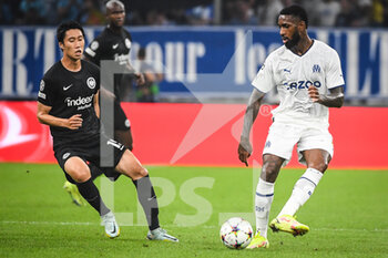 2022-09-13 - Daichi KAMADA of Eintracht Frankfurt and Gerson of Marseille during the UEFA Champions League, Group D football match between Olympique de Marseille and Eintracht Frankfurt on September 13, 2022 at Orange Velodrome stadium in Marseille, France - FOOTBALL - CHAMPIONS LEAGUE - OM V EINTRACHT FRANKFURT - UEFA CHAMPIONS LEAGUE - SOCCER