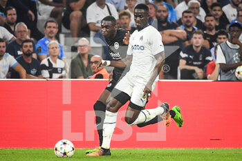 2022-09-13 - Randal KOLO MUANI of Eintracht Frankfurt and Eric BAILLY of Marseille during the UEFA Champions League, Group D football match between Olympique de Marseille and Eintracht Frankfurt on September 13, 2022 at Orange Velodrome stadium in Marseille, France - FOOTBALL - CHAMPIONS LEAGUE - OM V EINTRACHT FRANKFURT - UEFA CHAMPIONS LEAGUE - SOCCER