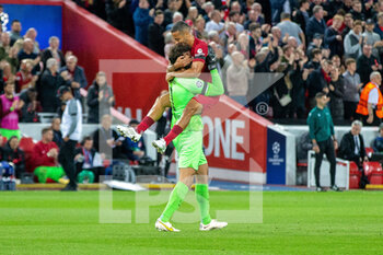 2022-09-13 - GOAL 1-0 Liverpool forward Mohamed Salah (11) scores (not in picture) and Liverpool midfielder Thiago Alcántara (6) celebrates with Liverpool goalkeeper Alisson Becker (1) during the Champions League match between Liverpool and Ajax at Anfield, Liverpool, England on 13 September 2022. Photo Ian Stephen / ProSportsImages / DPPI - FOOTBALL - CHAMPIONS LEAGUE - LIVERPOOL V AJAX - UEFA CHAMPIONS LEAGUE - SOCCER