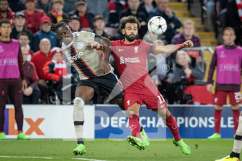 2022-09-13 - Ajax defender Calvin Bassey (3) appears to foul Liverpool forward Mohamed Salah (11) during the Champions League match between Liverpool and Ajax at Anfield, Liverpool, England on 13 September 2022. Photo Ian Stephen / ProSportsImages / DPPI - FOOTBALL - CHAMPIONS LEAGUE - LIVERPOOL V AJAX - UEFA CHAMPIONS LEAGUE - SOCCER