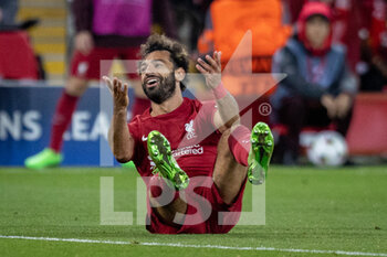 2022-09-13 - Ajax defender Calvin Bassey (3) (not in picture) tackles Liverpool forward Mohamed Salah (11) who reacts during during the Champions League match between Liverpool and Ajax at Anfield, Liverpool, England on 13 September 2022. Photo Ian Stephen / ProSportsImages / DPPI - FOOTBALL - CHAMPIONS LEAGUE - LIVERPOOL V AJAX - UEFA CHAMPIONS LEAGUE - SOCCER
