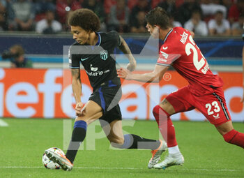2022-09-13 - Alex Witsel of Atletico Madrid and Adam Hiosek of Bayer Lerverkusen during the UEFA Champions League, Group B football match between Bayer Leverkusen and Atletico Madrid on September 13, 2022 at BayArena in Leverkusen, Germany - FOOTBALL - CHAMPIONS LEAGUE - BAYER LEVERKUSEN V ATLETICO MADRID - UEFA CHAMPIONS LEAGUE - SOCCER