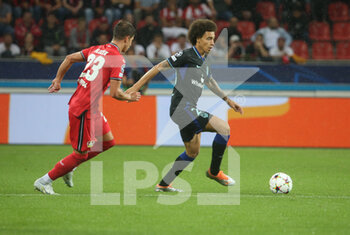 2022-09-13 - Alex Witsel of Atletico Madrid and Adam Hiosek of Bayer Lerverkusen during the UEFA Champions League, Group B football match between Bayer Leverkusen and Atletico Madrid on September 13, 2022 at in Leverkusen, Germany - FOOTBALL - CHAMPIONS LEAGUE - BAYER LEVERKUSEN V ATLETICO MADRID - UEFA CHAMPIONS LEAGUE - SOCCER