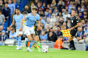 2022-09-14 - John Stones (5) of Manchester City during the Champions League match between Manchester City and Borussia Dortmund at the Etihad Stadium, Manchester, England on 14 September 2022. Photo Nigel Keene/ ProSportsImages / DPPI - FOOTBALL - CHAMPIONS LEAGUE - MANCHESTER CITY V BORUSSIA DORTMUND - UEFA CHAMPIONS LEAGUE - SOCCER