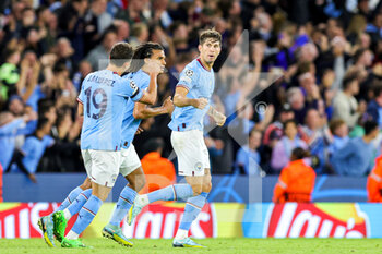 2022-09-14 - Goal 1-1 John Stones (5) of Manchester City scores a goal and celebrates during the Champions League match between Manchester City and Borussia Dortmund at the Etihad Stadium, Manchester, England on 14 September 2022. Photo Nigel Keene/ ProSportsImages / DPPI - FOOTBALL - CHAMPIONS LEAGUE - MANCHESTER CITY V BORUSSIA DORTMUND - UEFA CHAMPIONS LEAGUE - SOCCER