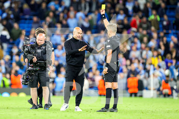2022-09-14 - Pep Guardiola Manager of Manchester City gets a yellow card at full time during the Champions League match between Manchester City and Borussia Dortmund at the Etihad Stadium, Manchester, England on 14 September 2022. Photo Nigel Keene/ ProSportsImages / DPPI - FOOTBALL - CHAMPIONS LEAGUE - MANCHESTER CITY V BORUSSIA DORTMUND - UEFA CHAMPIONS LEAGUE - SOCCER