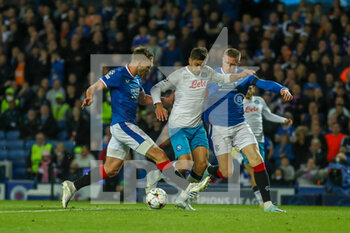 2022-09-14 - Giovanni Simeone (#18) of SSC Napoli through on goal and is brought down by James Sands (#19) of Rangers FC during the Champions League match between Rangers and Napoli at Ibrox, Glasgow, Scotland on 14 September 2022. Photo Colin Poultney / ProSportsImages / DPPI - FOOTBALL - CHAMPIONS LEAGUE - RANGERS V NAPOLI - UEFA CHAMPIONS LEAGUE - SOCCER