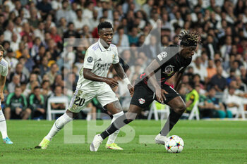 2022-09-14 - Vinicius Junior of Real Madrid and Amadou Haidara of Leipzig during the UEFA Champions League, Group F, football match played between Real Madrid and RB Leipzig at Santiago Bernabeu on September 14, 2022 in Madrid, Spain. Photo Irina R.Hipolito / SpainDPPI / DPPI - FOOTBALL - CHAMPIONS LEAGUE - REAL MADRID V  LEIPZIG - UEFA CHAMPIONS LEAGUE - SOCCER