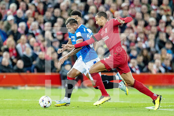 2022-10-04 - Liverpool defender Joel Matip (32) battles with Rangers forward Alfredo Morelos (20) during the UEFA Champions League, Group A football match between Liverpool and Rangers on October 4, 2022 at Anfield stadium in Liverpool, England - FOOTBALL - CHAMPIONS LEAGUE - LIVERPOOL V RANGERS - UEFA CHAMPIONS LEAGUE - SOCCER